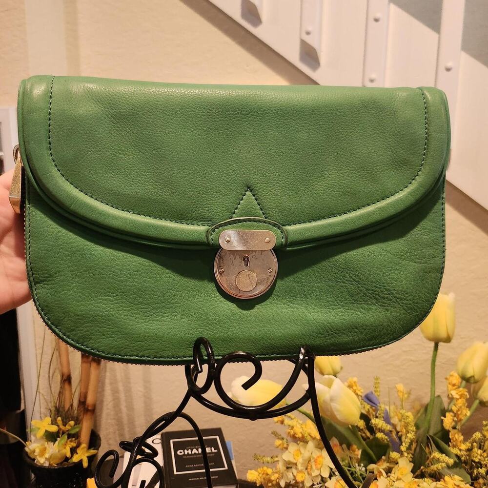 Pour la Victoire leather clutch with dust bag